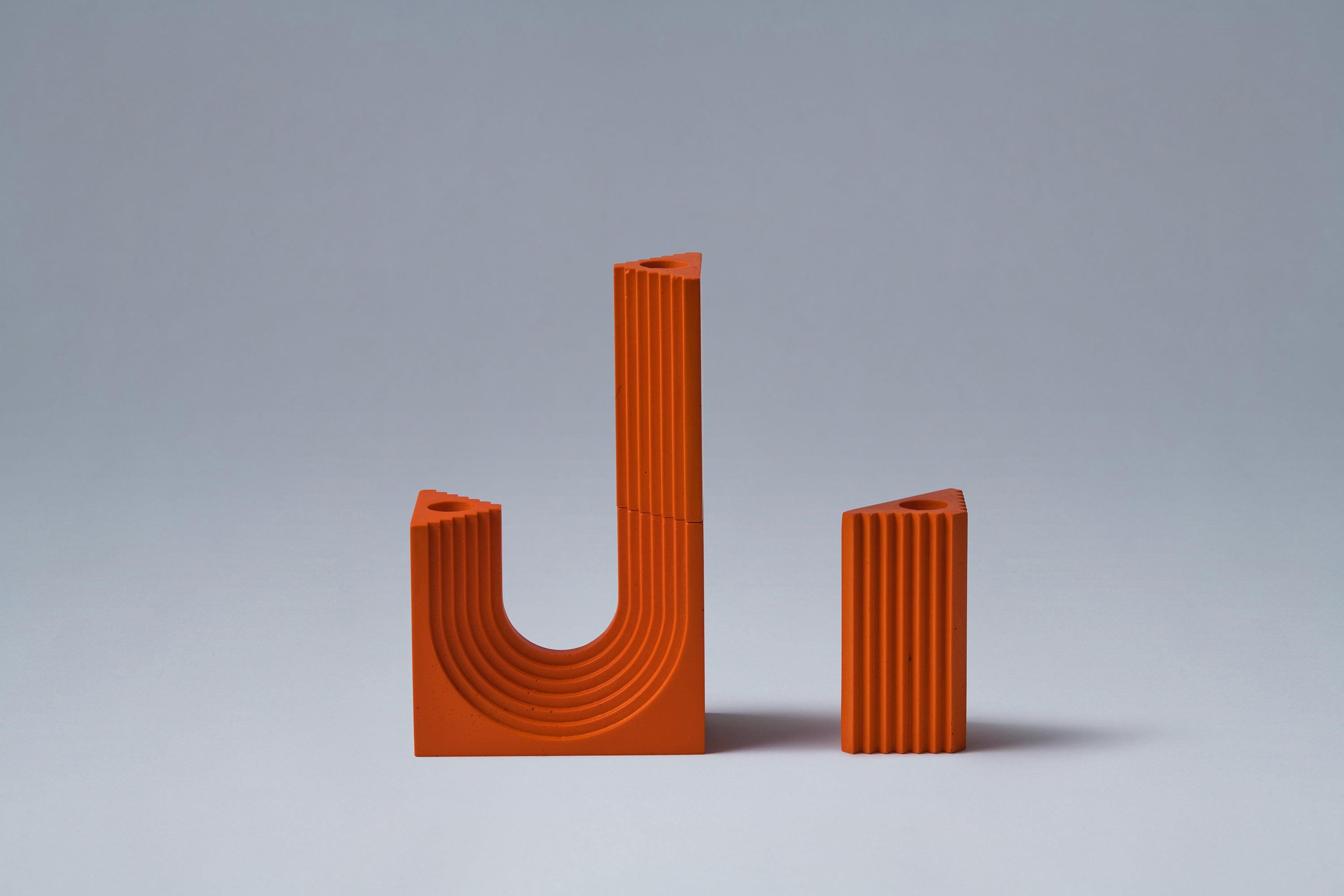 CURIO orange candle sculpture