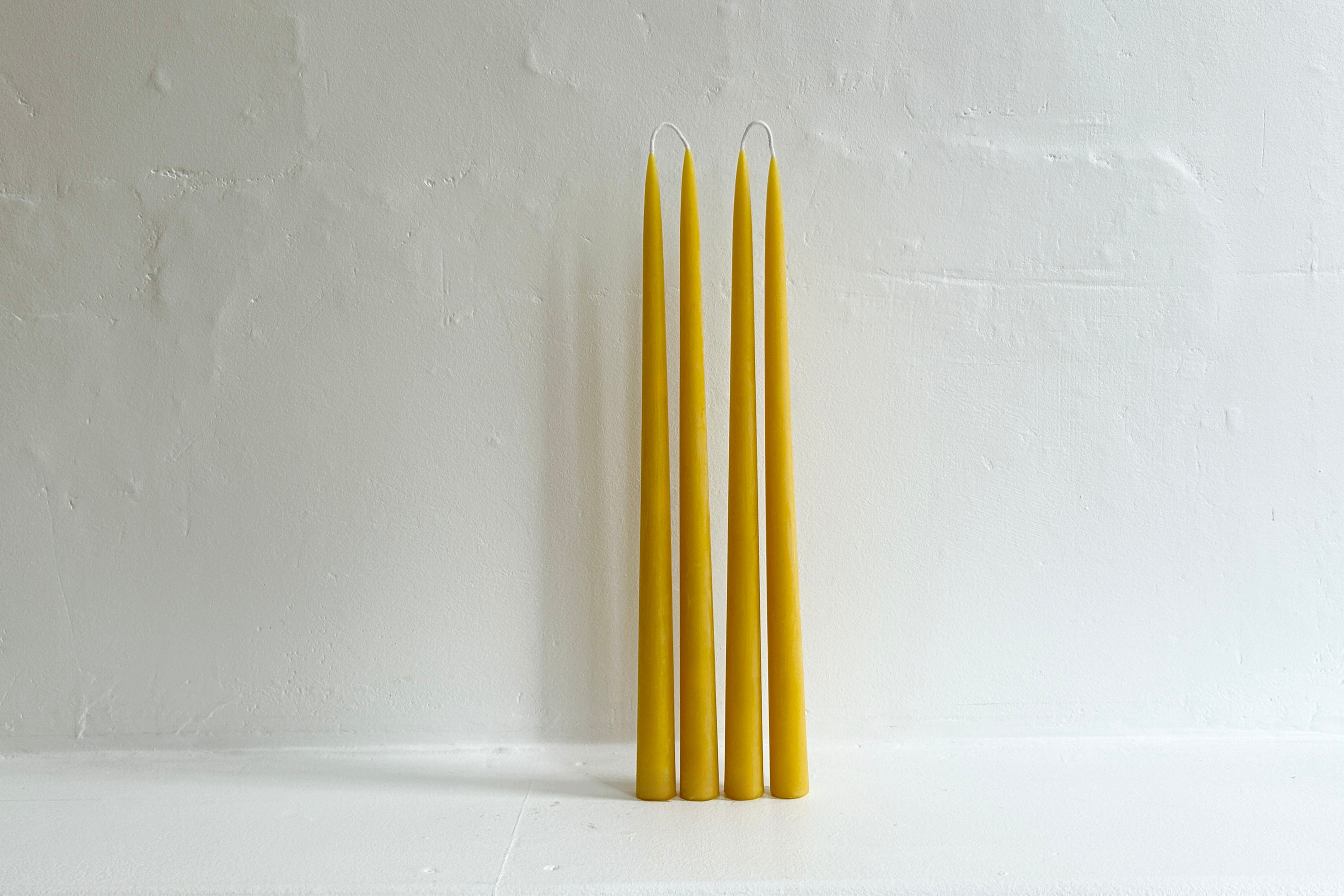 Honey coloured beeswax taper candles pack of four